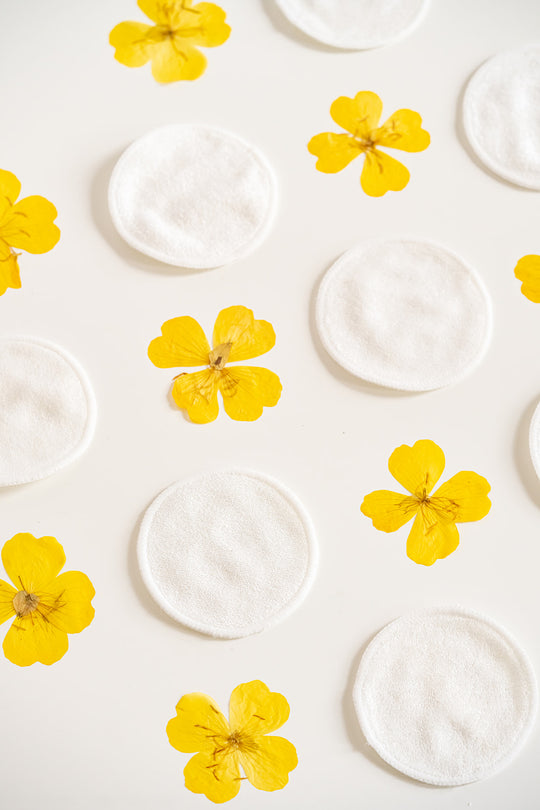 Cotton pads with yellow flowers.