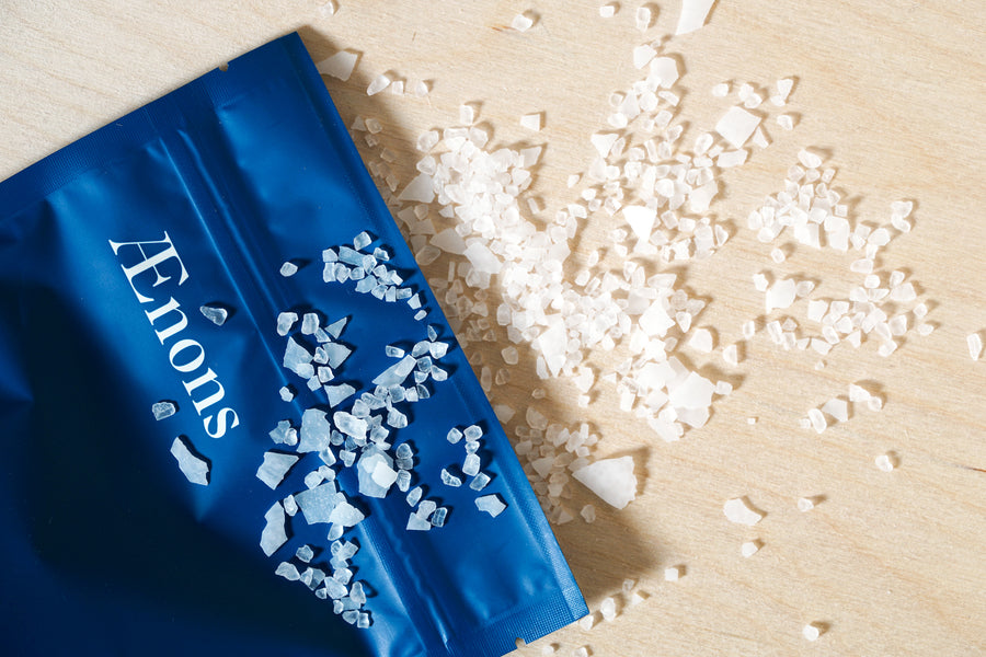 Relaxing bath salts with sea salt and magnesium flakes.